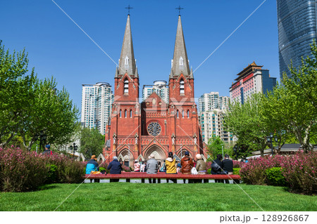 Chinese people at garden view St. Ignatius Xujiahui Cathedral, Shianghai 128926867