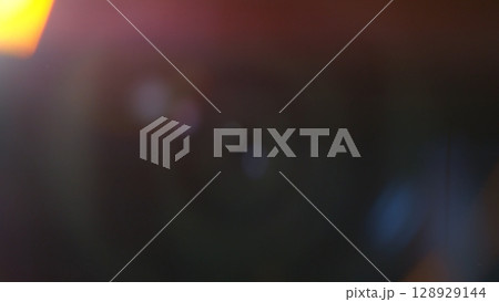 Abstract background of real lens flare for overlay or transition 128929144