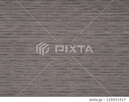 Subtle elegance in slate grey tones on a seamless ash wood veneer surface 128931417