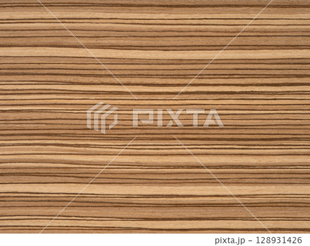 Zingana veneer surface with rich chocolate and caramel stripes in a natural linear pattern Zingana veneer surface with rich chocolate and caramel stripes in a natural linear pattern 128931426
