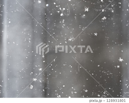 Snow, falling glass starry sky creates dreamy, captivating view, evoking sense calm winter night. Its gentle beauty leaves you feeling peaceful airy 128931801