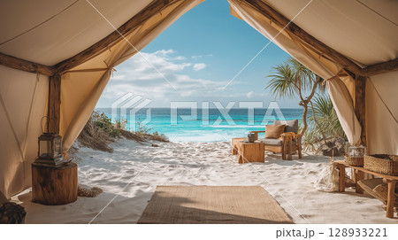 Glamping tent with ocean view on a serene beach 128933221