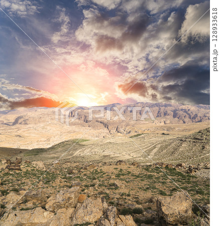 Typical mountain landscape, Jordan, Middle East  (photography from a high point). Against the background of a beautiful sky with clouds 128933618