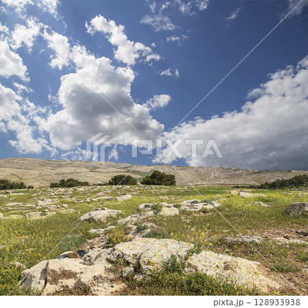 Typical mountain landscape, Jordan, Middle East  (photography from a high point). Against the background of a beautiful sky with clouds 128933938