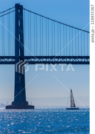 San Francisco Bay bridge sailboat from Pier 7 California 128935367