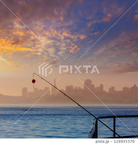 San francisco fog skyline with fishing rod in the mist California 128935370