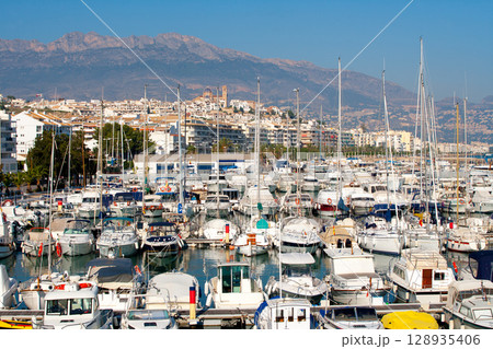 Altea village in alicante with marina boats foreground Altea village in alicante with marina boats foreground 128935406