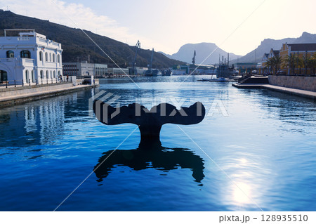 Whale tail sculpture in Cartagena port at Murcia Whale tail sculpture in Cartagena port at Murcia 128935510