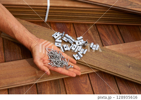 Ipe deck wood installation screws clips fasteners Ipe deck wood installation screws clips fasteners 128935616