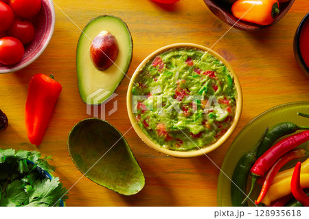 Mexican food mixed guacamole chili and avocado 128935618