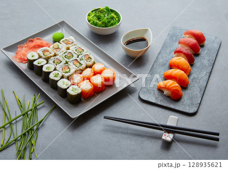 Sushi Maki and Niguiri soy sauce and wasabi Sushi Maki and Niguiri soy sauce and wasabi 128935621