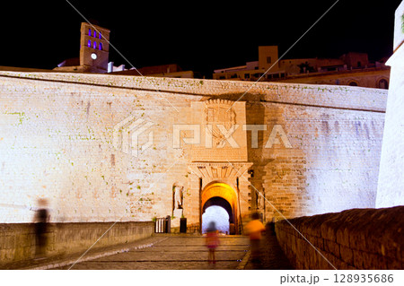 Ibiza castle night lights with fort main door 128935686