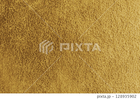 Close up, macro structure of yellow suede fabric with abstract embossed shabby, messy texture. Close up, macro structure of yellow suede fabric with abstract embossed shabby, messy texture. 128935902