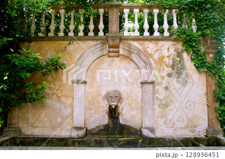 Lion stone sculpture fountain in Son Marroig at Deia 128936451