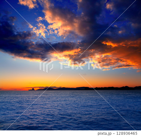 Ibiza island sunset with Es Vedra in background 128936465