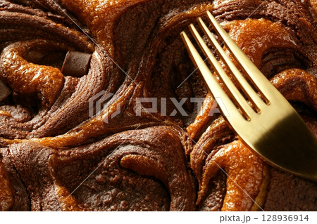 Chocolate cake crop macro texture, golden light 128936914