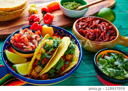 Tacos al pastor Mexican with coriander pineapple Tacos al pastor Mexican with coriander pineapple 128937059