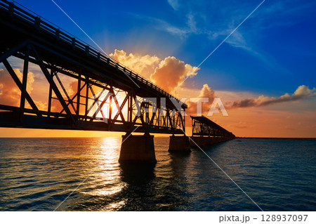 Florida Keys old bridge sunset at Bahia Honda Florida Keys old bridge sunset at Bahia Honda 128937097