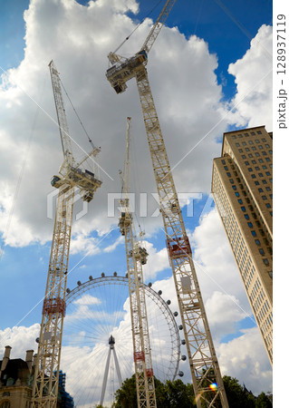 London with construction cranes downtown London with construction cranes downtown 128937119