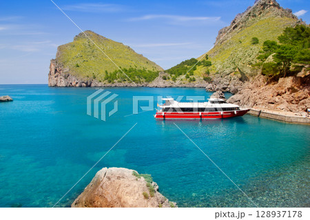 Escorca Sacalobra beach in north Mallorca with boat 128937178