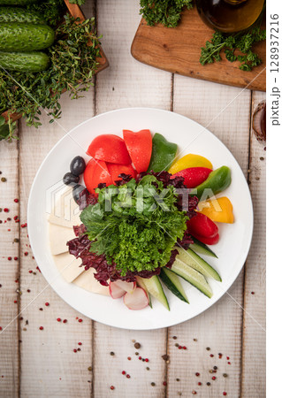 Fresh vegetable and cheese platter with herbs Fresh vegetable and cheese platter with herbs 128937216
