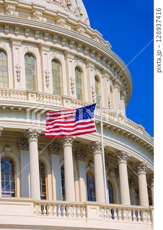 Capitol building Washington DC american flag USA 128937416