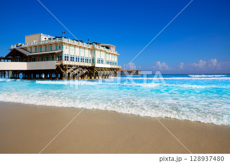 Daytona Beach in Florida with pier USA 128937480