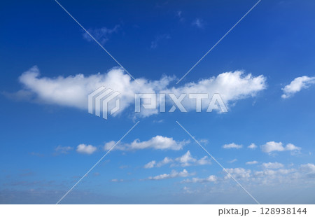 Blue summer sky with white clouds Blue summer sky with white clouds 128938144