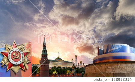Moscow Kremlin (with decorations for the holiday of May 9 in honor of Victory Day celebration (WWII). Against the sky with clouds, Russia. TRANSLATION: Victory!, Patriotic war 128938314