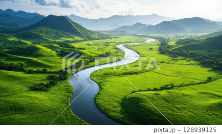 the image showcases a wide river snaking through a lush green valley, lined with trees and expansive meadows the image showcases a wide river snaking through a lush green valley, lined with trees and expansive meadows 128939125