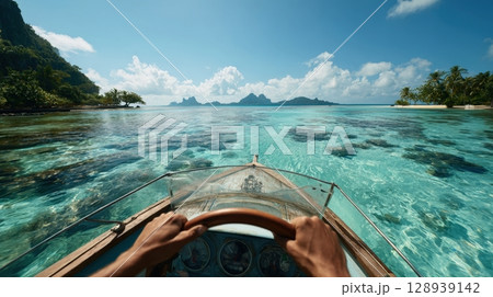 First-Person View Steering Boat on Tropical Lagoon with Crystal Waters 128939142
