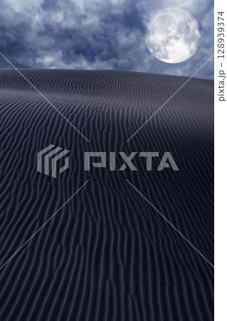 Desert dunes sand in moon night sky 128939374