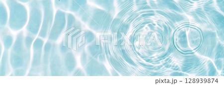 Ripples in clear blue water with abstract circular patterns, suitable as calming SPA background 128939874