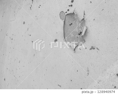 The Walls and backgrounds Old cement walls with black stains on the surface caused by moisture. Peeling wall surface with cracks and scratches, old rough gray cement wall surface for the background. The Walls and backgrounds Old cement walls with black stains on the surface caused by moisture. Peeling wall surface with cracks and scratches, old rough gray cement wall surface for the background. 128940974
