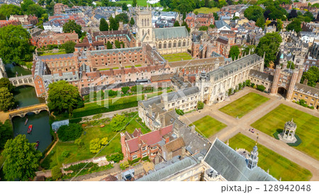 Cambridge University buildings and courtyards with river Cam flowing near by on a sunny summer day 128942048