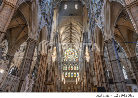 Intricate details of the gothic architecture inside Westminster Abbey showcase its stunning arches, elegant stained glass, and historical significance, attracting visitors year-round. Intricate details of the gothic architecture inside Westminster Abbey showcase its stunning arches, elegant stained glass, and historical significance, attracting visitors year-round. 128942063