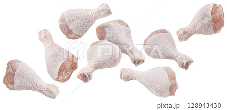 Falling raw chicken drumsticks isolated on white background with clipping path, full depth of field 128943430