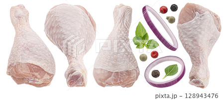 Raw chicken drumsticks with herbs and onion rings isolated on white background with clipping path, collection, full depth of field 128943476