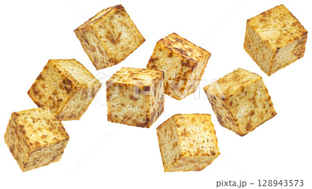 Falling fried tofu cubes isolated on white background with clipping path 128943573