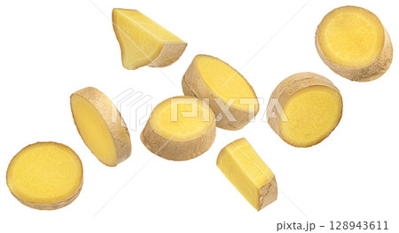 Ginger root slices isolated on white background with clipping path 128943611