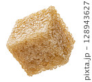 One cube of cane sugar isolated on white background, full depth of field 128943627
