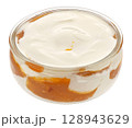 Fruit layered dessert, glass bowl of yogurt with apricot jam isolated on white background, package design element 128943629
