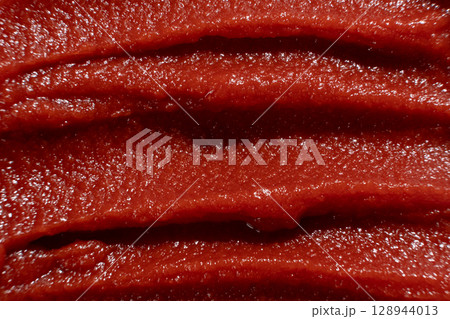 Macro Texture of Rich Tomato Paste. Culinary Red Background. 128944013