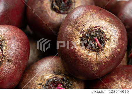 Organic Red Beetroot Vegetable Unpeeled and Uncut Organic Red Beetroot Vegetable Unpeeled and Uncut 128944030