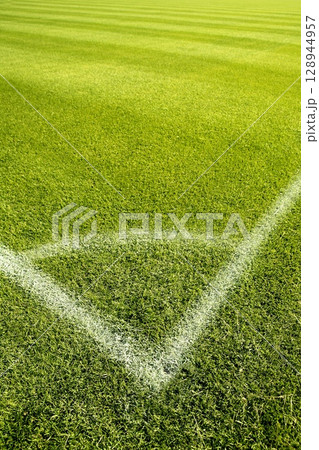 Football green grass field corner white lines Football green grass field corner white lines 128944957