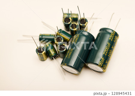 Electrolytic capacitors of different nominal values. Energy storage devices. Electronic radio elements. Electrolytic capacitors of different nominal values. Energy storage devices. Electronic radio elements. 128945431