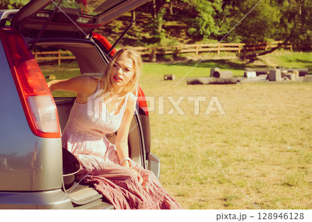 Woman relaxing in car 128946128