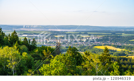 Hradek nad Nisou is visible with its scenic landscape, surrounded by lush greenery and fields. 128946319