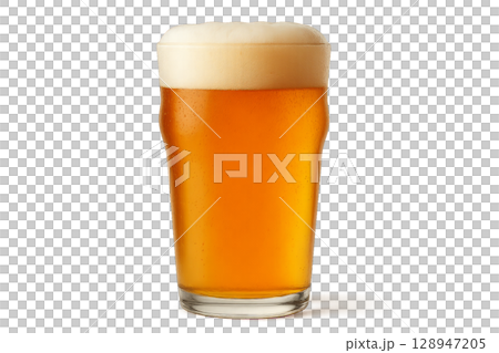 Golden Beer in a Tall Glass With Frothy Head on Display in a Casual Setting 128947205
