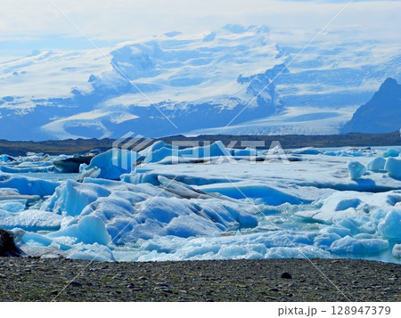 Iceland diamond beach glacial lake Jokulsarlon lagoon with icebergs, ice floes.  128947379